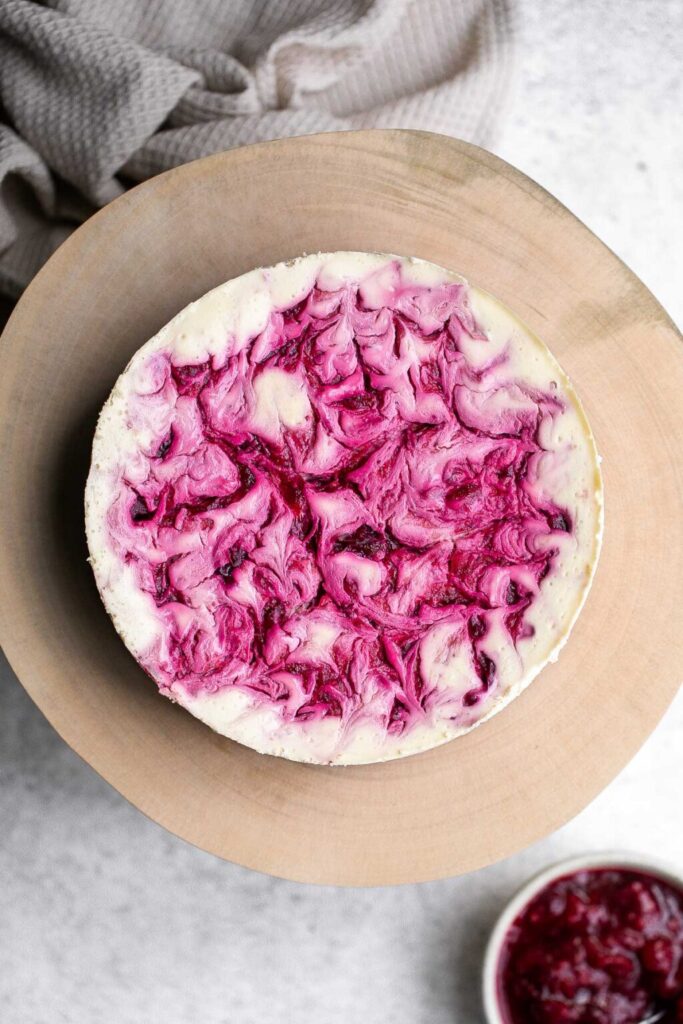 Cranberry Sauce Swirl Cheesecake by Ahead of Thyme