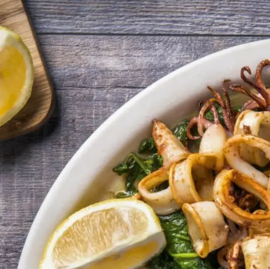 Lemon and Garlic Squid with Samphire, Mango and Pea Salad by Heart UK